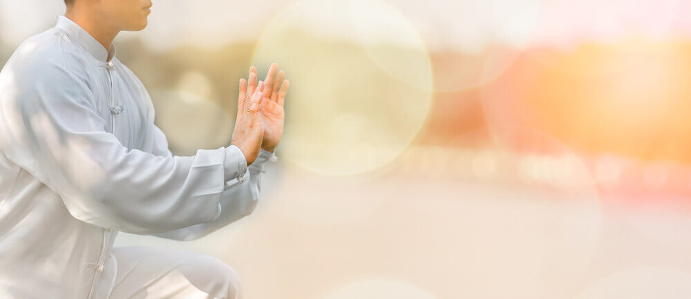 old man doing tai chi